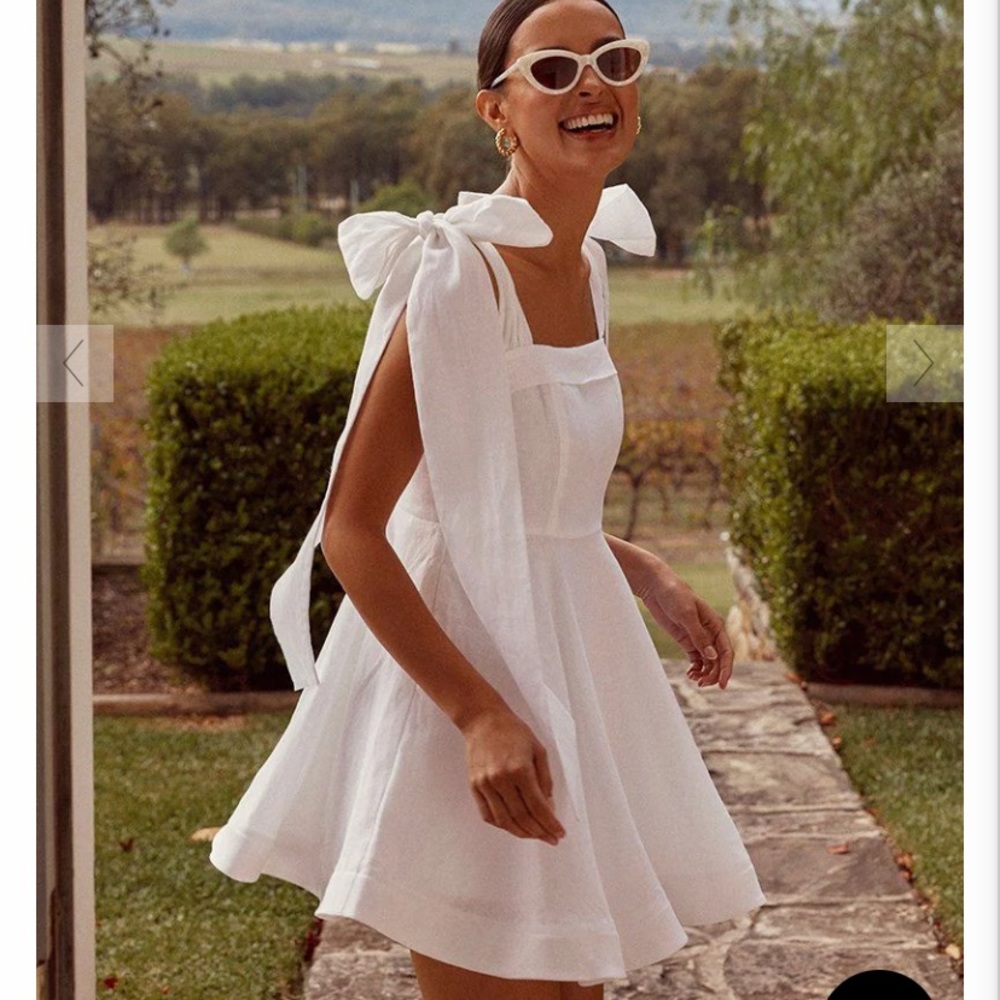 AISLE WHITE LINEN BOW MINI DRESS